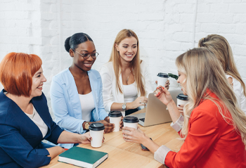 Leadership meetings Group of women talking with each other